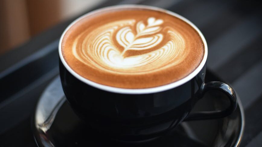close up of coffee cup on table